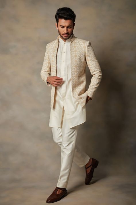 Off white, cream jacket style bandhgala with geometric embroidered motifs. Paired with cotton silk kurta and pant. Component: 3 Pattern: Embroidered Type Of Work: Geometric Neckline: Open Sleeve Type: Full Sleeves Fabric: Rayon, Cotton Silk Color: Beige,White Other Details:  Embroidered bandhgala Geometric motifs Occasion: Wedding - Aza Fashions Men Ethnic Wear India, Indo Western Outfits For Men, India Fashion Men, Indian Wedding Suits Men, Wedding Kurta For Men, Anniversary Outfit, Kurta Set For Men, Cotton Wedding, Men's Ethnic Wear