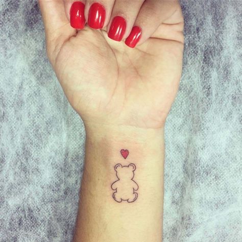 100 Lovable Teddy Bear Tattoo Designs with Meanings and Ideas 38 Teddy Bear Outline Tattoo, Tiny Teddy Bear Tattoo, Teddy Bear Tattoo Designs, Cute Bear Tattoo, Blue Ribbon Tattoo, Teddy Tattoo, Teddy Bear Outline, Teddy Bear Tattoo, Tattoo Linework