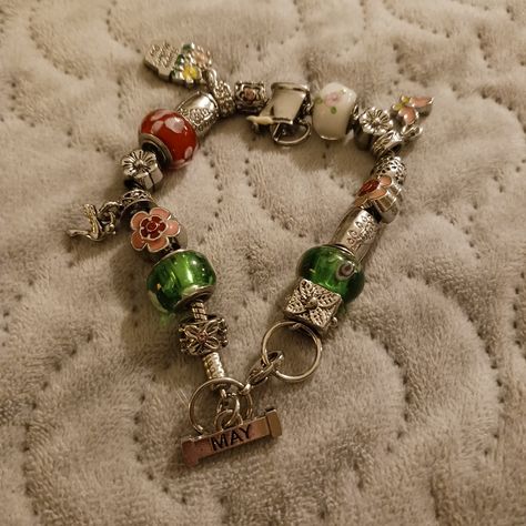 This Is New, Ordered Online So It Never Had Tags Attached, But It's In Excellent Condition, No Damages! Cute Charms That All Have To Do With The Month Of May! This Would Make A Perfect Gift!! All Charms Are In Perfect Condition, No Tarnishing, Etc! This Was Never Worn, Just Sat In One Of My Jewelry Stands For Quite Some Time!! Please Look At All Photos, Zoom In, Selling As Is! Price Is Firm Unless Bundled! Smoke Free, Pet Friendly! I Ship Same Or Next Day, Even Sunday's And Holiday's!! Cluttercore Jewelry, Mixed Metal Jewelry Stack, Madeleine Core, Vintage Jewelry Aesthetic, Trinkets Aesthetic, Charm Bracelet Aesthetic, Thrifted Jewelry, Thrift Jewelry, Childhood Core