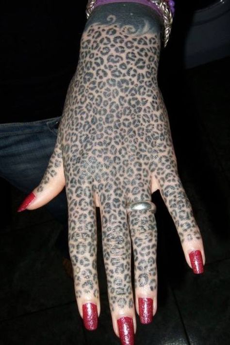 Leopard full hand tattoo Unique Hand Tattoos, Headdress Tattoo, Leopard Tattoo, Full Hand Tattoo, Emo Tattoos, Lion Tattoo Sleeves, Leopard Tattoos, Full Arm Tattoos, Forarm Tattoos