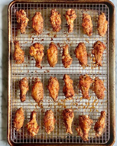 Baked Chicken Wings (Crispy, With Baking Powder) | Kitchn Crispy Baked Chicken Wings Recipe, Honey Sriracha Chicken Wings, Sriracha Chicken Wings, Wings Recipe Baked, Crispy Baked Chicken Wings, Wings In The Oven, Honey Sriracha Chicken, Chicken Wing Recipes Baked, Baked Wings