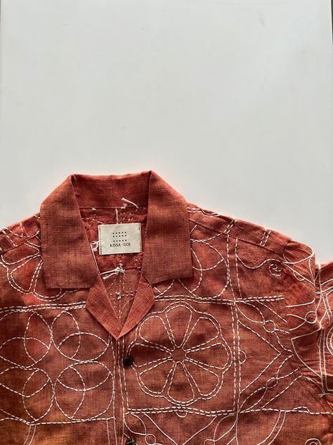 Burnt orange linen shirt, echoing warmth and texture of terracotta tiles Hand-embroidered | Linen On model: Cuban collared, size L NOTE: Each hand embroidered is unique and may slightly differ from the images shared. Embroidery Men’s Shirts, Unique Shirt Designs For Men, Hand Embroidered Shirts, Handwork Design, Surface Design Textile, Pleasure Garden, Shirt Upcycle, Unique Shirts Design, Design Tshirts