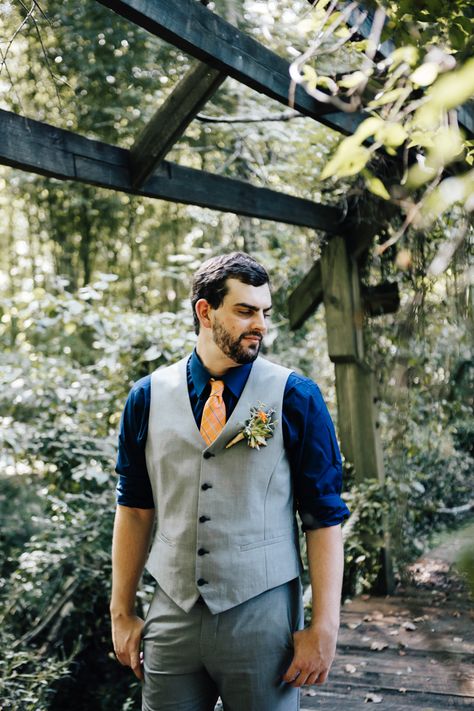 Groom Grey Vest Pants Navy Blue Shirt Orange Checkered Tie Buttonhole Orange Florals Greenery Succulent Adventure Inspired Woodland Wedding North Carolina http://www.amandasuttonphotography.com/ Groom In Jeans, Vest For Men Wedding, Navy Groom, Casual Grooms, Wedding Vest, Strapless Shirt, Navy Shirt Dress, Navy Blue Shirt, Childhood Dreams