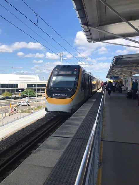 Train arriving at the Brisbane airport Brisbane Airport, Vertical Images, Metro Station, Bright Lights, Train Travel, Brisbane, Short Film, Travel Around The World, Travel Around