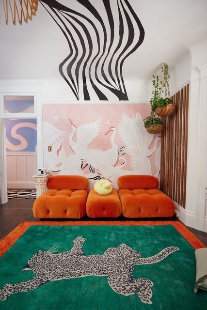 Apartment Therapy on Instagram: "With a vibe of dopamine design, mid-century eccentric, and whimsical maximalism, @taybeepboop's home is a combo of color and amusement. “My place is a gorgeous Victorian home and I love and appreciate the historic aesthetic and charm, and I never want to change the features or remove the history,” Tay says. “I just want to inject fun and levity into the space.” Click the link in our bio to see more of this San Francisco home ✨ 🏡: @taybeepboop; 📸: @seekingsocial Black Eames Chair, Wall Trim Molding, Painted Fridge, Maximalist Interior, Gallon Of Paint, Wall Trim, Painted Ceiling, Tiki Bar, Apartment Therapy