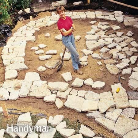 Build a Stone Patio or Brick Patio: Installing the stone http://www.familyhandyman.com/patio/build-a-stone-patio-or-brick-patio/view-all Laying Pavers, Natural Stone Patio, Patio Step, Building A Patio, Brick Patio, Patio Steps, Stone Patio, Flagstone Patio, Diy Deck