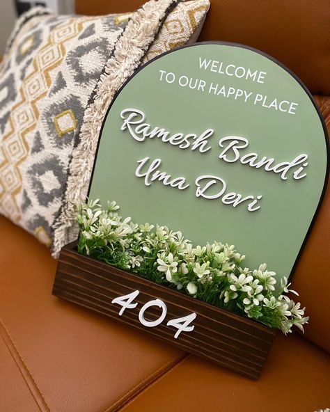 Make a statement from the moment you step foot at your entrance! 🌿Thanks to our customers for sharing these delightful setups🤍 Home Decor, Name Plate, Name Sign, Indian home, Entrance Decor, Housewarming, New Home Home Entrance Name Plate, Name Plate Designs For Home, Name Plate For Home, Name Board For Home, Entrance Name Plate Design Modern, House Name Plate Design, House Warming Decoration, Name Plates For Home Indian, Nameplates Design Ideas For Home Indian