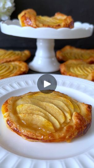 580K views · 27K reactions | Tarte Fine aux Pommes Recipe 🤍

Immerse yourself in the world of French patisserie with this simple and delightful recipe for Tarte Fine aux Pommes 🥰

📝  Ingredients:

- 1 sheet puff pastry
- 2 large apples (Braeburn or Boskoop)
- Apricot jam
- 1 tbsp lemon juice
- 2 tbsp brown sugar
- 1 tsp cinnamon
- ⁠1 egg yolk

🤍  Preparation:

1. Preheat the oven to 200°C (392°F) and line a baking sheet with parchment paper.

2. Peel, core, and thinly slice the apples. Drizzle with lemon juice to prevent browning.

3. Roll out the puff pastry sheet on a lightly floured surface and cut out 7-8 circles or squares.

4. Place the puff pastry circles on the prepared baking sheet.

5. Gently heat the apricot jam to make it more spreadable. Brush a thin layer of the warmed ja Maple Pie, Puff Pastry Recipes Dessert, French Apple Tart, Food Reels, Pastries Recipes Dessert, European Dishes, Apple Puff Pastry, Puff Pastry Desserts, Afternoon Tea Recipes