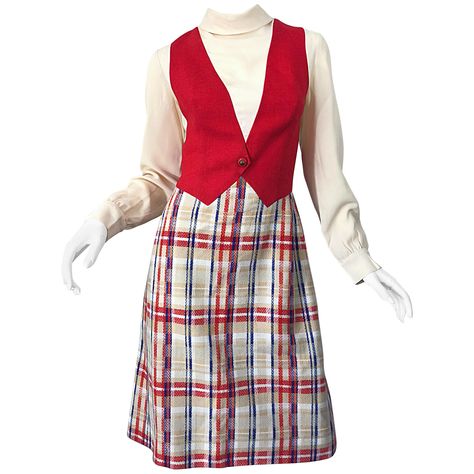 Chic mid 1960s PAT SANDLER red, white (ivory) and blue trompe l'oeil long Sleeve A-Line dress! Features a high necked ivory crepe bodice with a mock vest sewn into the dress to look like the dress is layered, when it is actually one piece. Soft wool plaid skirt gives this gem a nautical feel. Skirt is fully lined. Full metal zipper up the back with hook-and-eye closures. In great condition. Made in USA Approximately Current Size Medium Measurements: 36-38 inch bust 30-31 inch waist 42-44 inch hi 1960s Mod Fashion, 70s Inspired Fashion, Cocktail Dress Vintage, Designer Evening Dresses, Karate Kid, 1960s Fashion, Line Dress, 60s Fashion, Blue Vintage