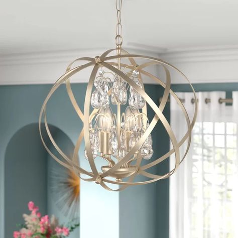 Enliven and uplift your room with this effulgent chandelier. Antique bands swirl around stunning crystals and four candelabra bulbs for a glimmering and incandescent accent for any space in need of ambient illumination. Pendent Lights, Kitchen Lights, Wheel Chandelier, Candle Style Chandelier, Geometric Chandelier, Globe Chandelier, Traditional Chandelier, Drum Chandelier, Gold Chrome