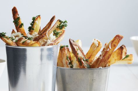 Short and thick, these oven-baked fries are modeled after British “chips.” Parsley, Parmesan, and truffle oil toppings give them a gourmet feel. British Chips, Truffle Chips, Oven Baked Fries, Pillsbury Recipes, Truffle Fries, Oven Fried, Short And Thick, Baked Fries, Vegan Sides