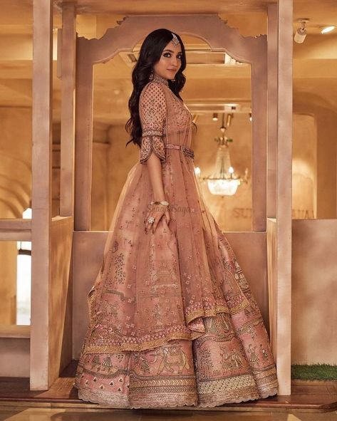 Introducing latest Rose gold lehengas for Brides .From simple rose gold pink lehenga to bridal rose gold lehenga, we have got amazing designs for all. #shaadisaga #indianwedding #rosegoldlehengabridal #rosegoldlehengaindianweddings #rosegoldlehengasimple #rosegoldlehengacholi #rosegoldlehengasabyasachi #rosegoldlehengacontrast #rosegoldlehengabride #rosegoldlehengabeautiful #rosegoldlehengadark #rosegoldlehengaforengagement #rosegoldlehengablouse #rosegoldlehengabridesmaids #rosegoldlehenga Bridal Walima Dress, Lehenga For Engagement, Walima Dresses, Pink Bridal Lehenga, Latest Bridal Lehenga Designs, Gold Lehenga, Walima Dress, Bridal Lehenga Designs, Latest Bridal Lehenga