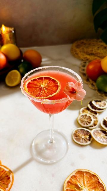 Beautiful Booze Cocktails on Instagram: "Winter Citrus Series: Recipe 5 Blood Orange Honey Lemon Drop 🍋🍯🍊See recipe below:  Blood Orange Honey Lemon Drop🍯🍋🍊 Ingredients  2 ounces Vodka  1/2 ounce @cointreau_us  1 ounce Blood Orange Juice  3/4 ounce Honey Syrup  1 ounce Lemon Juice   Method  Rim glass with salt and lemon zest rim  Add all ingredients to a shaker then shake  Strain into glass and garnish with dried citrus and edible flower   #BeautifulBooze #wintercitrus #Bloodorange#bloodorangecocktails #cocktails #drinks #lemondrop #bloodorangelemondrop" Blood Orange Cocktail, Dried Citrus, Orange Honey, Blood Orange Juice, Honey Syrup, Dried Oranges, Honey Lemon, Lemon Drop, Edible Flowers