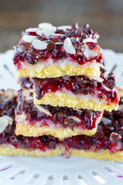 Chocolate Raspberry Magic Bars have a combination that everyone loves. Raspberry and chocolate! Raspberry Coconut Magic Bars, Recipes With Raspberry Jam, Raspberry Dessert Bars, Magic Bars Recipe, Recipes Using Cake Mix, Raspberry Bars, Magic Cookie Bars, Raspberry Desserts, Magic Bars