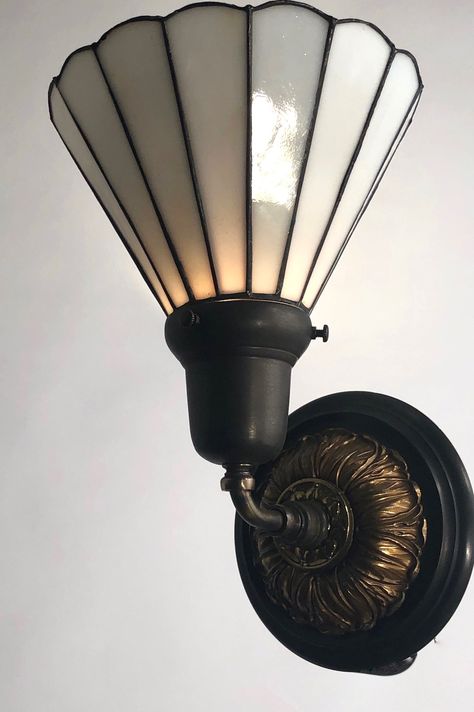 This Great set of 8 Slag Glass Sconces, Circa 1915 would go great in many spaces such as a stairwell, bathroom, hallway.  The Glass is white in color. Very nice leaded pattern with acanthus detailed back plate. $1025.00 each Talk to us. 1910 Light Fixtures, 1920s Light Fixtures, 1920s Bathroom Sconces, Victorian Sconces, Victorian Wall Sconces Lights, 1920s Light Fixtures Wall Sconces, 1920s Sconces, Sears Catalog Homes, Antique Wall Lights