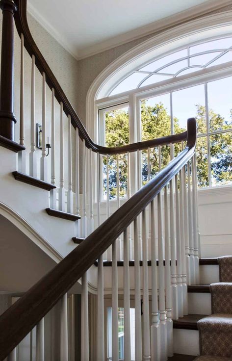 Tour a colonial revival farmhouse with traditional Southern charm Colonial Revival House, Decoration Hall, Southern Colonial, Traditional Staircase, Vintage Porch, Colonial Farmhouse, Colonial Interior, White Tile Backsplash, Stair Landing