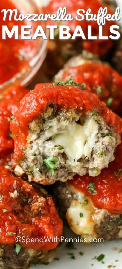 This mozzarella stuffed meatballs recipe is one of the best! It packs so much flavor into every bite. A ground turkey or beef mixture is wrapped around a cube of mozzarella cheese and baked until ooey-gooey! Then simmered in a homemade tomato sauce before being served over a bed of your favorite pasta.  #spendwithpennies #mozzarellastuffedmeatballs #homemadetomatosauce #pasta #Italian #appetizer Italian Appetizer, Stuffed Meatballs, Mozzarella Stuffed Meatballs, Italian Meatballs Recipe, Spaghetti Dinner, Spend With Pennies, Tomate Mozzarella, Italian Appetizers, Homemade Tomato Sauce