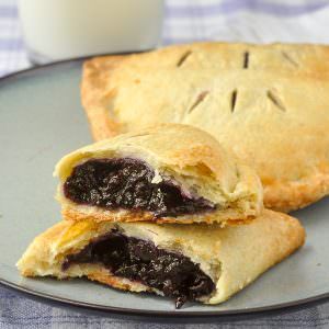 Blueberry Turnovers - a pre-cooked blueberry pie filling and a forgiving sweet butter pastry recipe make these turnovers practically foolproof. Blueberry Cakes, Blueberry Turnovers, Newfoundland Recipes, Butter Pastry, Sweet Pies, Blueberry Pie Filling, Rock Recipes, Pastry Recipe, Blueberry Desserts