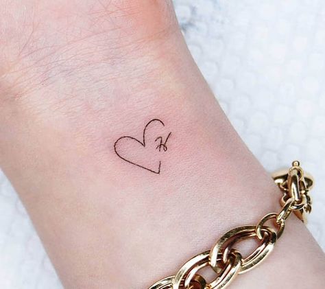 Small heart-shape H tattoo by @tattoo.choi T Heart Tattoo, Small Husband Tattoo, Partners Initials Tattoo, Daughter Initial Tattoo, Cute Boyfriend Tattoo Ideas, Heart M Tattoo, Partner Initial Tattoo, Small Tattoo Ideas Heart, Small Heart Tattoo With Initials