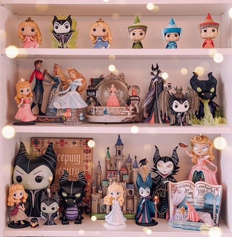 RaeRae | Disney Collector on Instagram: “Happy Shelfie Sunday! Here is my Sleeping Beauty collection, so far. I’m thinking I might need to expand it to another shelf soon. What…” Disney Shelf, Funko Pop Shelf, Disney Display, Pop Shelf, Funko Pop Shelves, Disney Funko Pop, Cinderella Collection, Funko Pop Display, Movies Characters