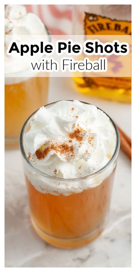 Shot glass with drink and whipped cream. Apple Pie Cocktail Fireball, Fall Shots Recipes, Apple Pie Alcohol Recipe, Easy Fall Shots, Fireball Pumpkin Pie Shots, Apple Pie Shots With Vodka, Pumpkin Pie Alcoholic Drink, Hot Apple Pie Cocktail, Baileys Apple Pie Recipes Drinks