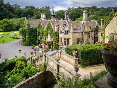 Castle Combe Manor House | This extraordinary estate is now a 5-star hotel and golf club. The house was built in the 14th century and has 48 rooms and 365 acres (1.5 km2) of gardens. The grounds' Italian, Classical and medieval Gothic styled gardens and summerhouse were added in the mid-19th century and are still maintained today. Castle Combe Manor House, Shifting Places, Old English Manor, English Estates, Tv Houses, Manor House Hotel, English Estate, 19th Century England, Setting Inspiration