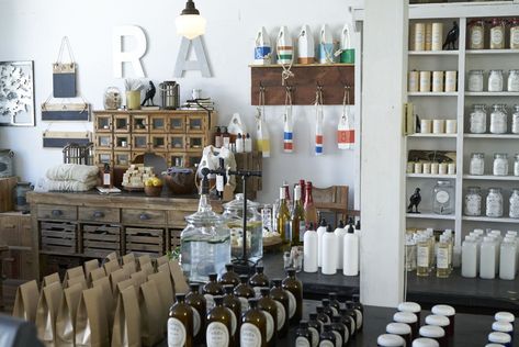 Rose Apothecary | Schitt's Creek Wiki | Fandom Stocking Shelves, Apothecary Design, Apothecary Decor, Ivory Pillar Candles, Rose Apothecary, Zero Waste Store, Southern Decor, Plungers, Schitt's Creek