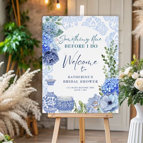 This blue and white flower bridal shower welcome sign features blue hydrangea flower with peonies and flowers in dusty blue,dark blue ,navy and white color with eucalyptus leaves.A Perfect something blue before i do theme bridal shower decor welcome sign. Something Blue Before I Do, White Bridal Shower Theme, Flower Bridal Shower, Bridal Shower Inspo, Blue Hydrangea Flowers, White Bridal Shower, Blue Bridal Shower, Bridal Shower Tables, Wedding Shower Decorations