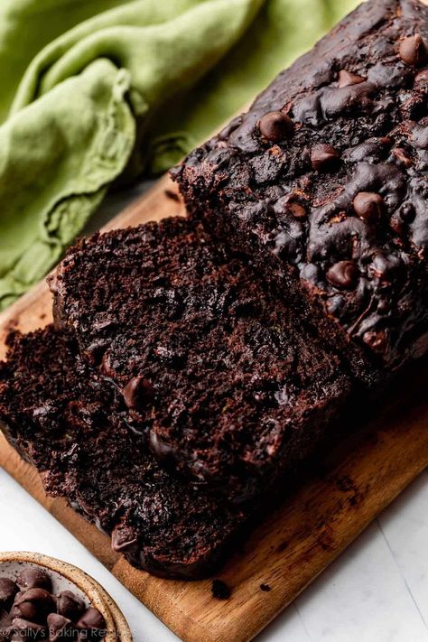 This easy double chocolate zucchini bread is deeply chocolatey and soft, and you can't even tell there's a vegetable hiding inside! Greek yogurt and coconut oil keep the quick bread extra moist. It's not overly sweet, so the chocolate flavor really stands out. You'll want to double this recipe! Recipe on sallysbakingaddiction.com Berry Yogurt Cake, Chocolate Zucchini Bread Recipe, Cake Flour Substitute, Chocolate Roll Cake, Zucchini Bread Recipe, Chocolate Zucchini Bread, Sally's Baking, Blueberry Lemon Cake, Breakfast Casserole Easy