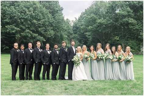 Sage Green Bridesmaid Dress And Groomsmen, Sage Green And Black Groomsmen Attire, Sage Green And Black Bridal Party, Sage Green And Black Tux Wedding, Groomsmen With Sage Green Bridesmaids, Black Tux Sage Green Tie, Black Tux With Sage Green Tie, Black Tux With Sage Green, Sage Green And Black Wedding Party