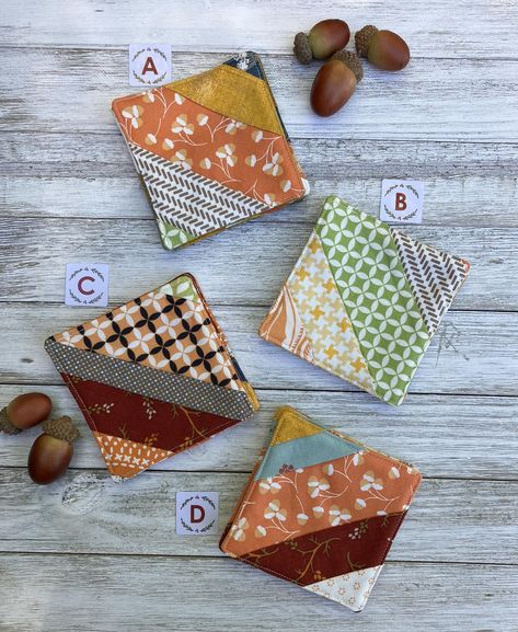 Handmade set of 4 quilted fabric coasters or mug mats made with fall fabric in, orange, yellow, burgundy, blues, and greens with acorns and other fall motifs. Mug mats are approximately 3.5" square. Listing is for 1 set of 4 mug mats. Please choose set from drop down.  Each coaster is made of 2 layers of fabric and one layer of batting and then quilted together. All materials are 100% cotton and machine washable and dry able. Fall Motifs, Mug Mats, Mug Mat, Quilted Coasters, Thanksgiving 2024, Mug Rug Patterns, Quilted Potholders, Small Sewing, Quilted Gifts