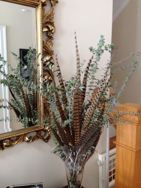 Pheasant Feather Crafts Diy, Framed Turkey Feathers, Wildlife Decorating Ideas, Duck Mounts In Living Room, Decorating With Feathers, Turkey Feather Decor, Pheasant Decor, Pheasant Feather Decor, Duck Table