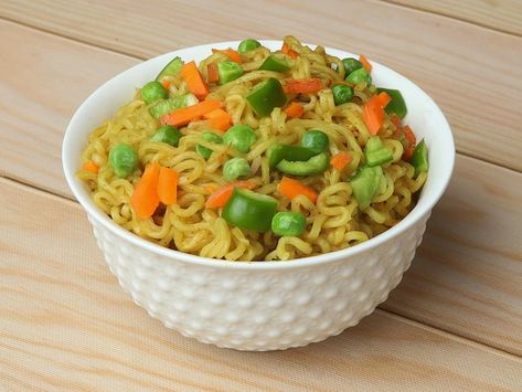 Photo mixed veg masala maggie noodles in... | Premium Photo #Freepik #photo #indian-breakfast #chinese-noodles #appetizer #homemade-food Maggie Noodles, Instant Noodles, Mahi Mahi, Wooden Background, Food Snapchat, A Bowl, Side Effects, Premium Photo, Noodles