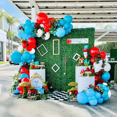 Cathay Bank 60th Anniverary “Road to Success” with a Alice in Wonderland Vibe. Decor Design, Set up, and Props by @bizziebeecreations ||… | Instagram Alice In Wonderland Birthday Backdrop, Alice And Wonderland Backdrop, Alice In Wonderland Balloon Decor, Alice In Wonderland Balloons, Alice In Wonderland Photo Backdrop, Alice In Wonderland Balloon Arch, Smurfs Party Decorations, Alice In Wonderland Backdrop, Ring Dance