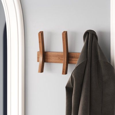 A mid-century-modern-inspired design, this 3-hook wall-mounted coat rack adds functionality and sophisticated design to any entryway, mudroom, laundry room, or bathroom. Handmade in the USA, it's made from solid knotty alder wood. The elongated, solid wood hooks summon the feel of a British or Scandinavian entryway with their sleek, minimalist style. Versatile enough for use just about anywhere, you can use it as a coat rack, towel rack, or storage rack for all of your essentials. Wade Logan Col Place To Hang Coats Entryway, Entryway Without Closet, Entrance Coat Hanger Ideas, Mid Century Modern Mudroom, Mid Century Modern Entrance, Wall Mounted Coat Rack Entryway, Coat Hooks Entryway, Clothes Ladder, Wood Coat Rack Wall