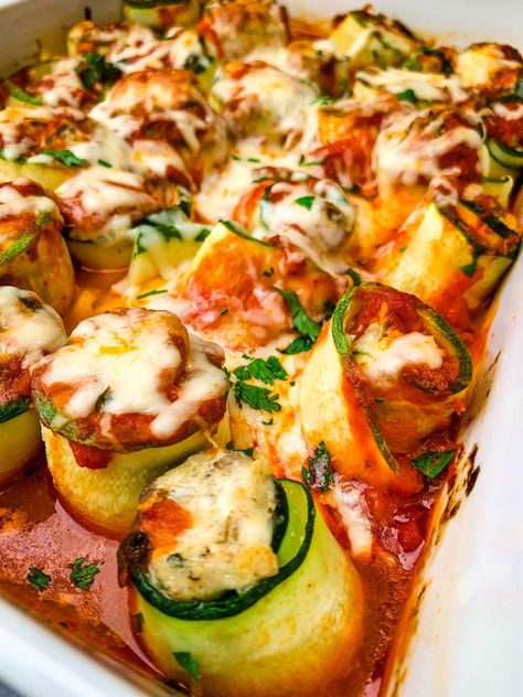 Easy, Zucchini Lasagna Roll Ups is the best recipe for veggie rolls stuffed with ricotta, cream cheese, and meat. This dish is keto-friendly and smothered in marinara and gooey melted cheese. You can serve it with zucchini noodles if you prefer. #ZucchiniLasagna #KetoRecipes #KetoLasagna Zucchini Lasagna Roll Ups, Easy Zucchini Lasagna, Lasagna Roll Ups Recipe, Zucchini Lasagna Rolls, Veggie Rolls, Zucchini Ravioli, Zucchini Rolls, Lasagna Roll Ups, Lasagna Roll