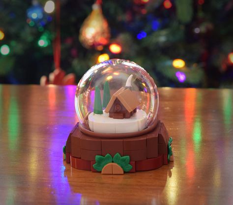 Snowglobe | Hey everyone! Here's another little Christmas bu… | Flickr Lego Snow Globe, Diy Lego, Lego Christmas, Seasonal Changes, Winter Village, Lego Ideas, Snow Globe, I Made It, Made It