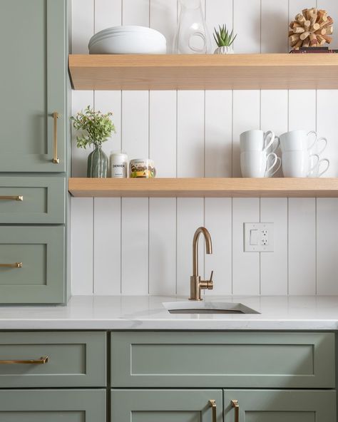 Feeling inspired by this beautifully crafted space featuring soft green cabinets, gold hardware, and warm wooden shelves against a clean white shiplap backdrop. From the thoughtful decor to the functional yet elegant design, every detail in this kitchen shines. Huge thanks to @laurabsanders for graciously opening her home and to Beacky @vmdwell for helping with the design and color choices 💚. Crafted with care by @forsyth.remodeling Green Cabinets Gold Hardware, Soft Green Cabinets, Shiplap Backdrop, Cabinets Gold Hardware, White Shiplap, Feeling Inspired, Green Cabinets, Oak Cabinets, Wooden Shelves