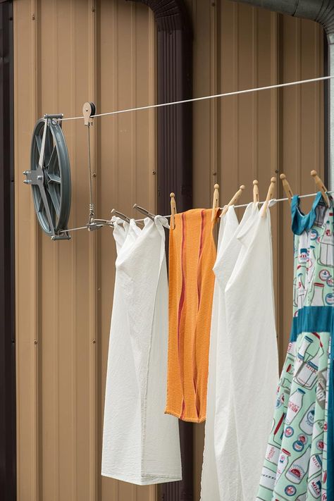 On the Line: Our Staff's Laundry Favorites Clothes Lines Ideas Outdoor, Pulley Clothesline, Diy Clothesline, Washing Clothes By Hand, Outdoor Clothes Lines, Clothesline Diy, Clothesline Poles, Diy Gothic, Laundry Lines