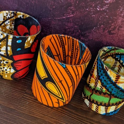 Check out this item in my Etsy shop https://www.etsy.com/uk/listing/275029344/african-candle-holder-set-random-mix-of African Crafts Walmart, African Candle Holders, Ankara Accessories Handmade, Ankara Pillow Cases, Ankara Cushion Covers, Wedding Candle Holder, African Inspired Wedding, African Vibes, African Shop