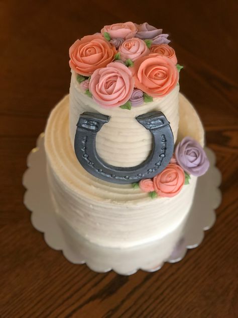 Two tier cake with buttercream flowers and fondant horseshoe Horse Shoe Cake, Fondant Horse, Spirit Birthday, Seventh Birthday, Cowgirl Cakes, Cake With Buttercream, Shoe Cake, Two Tier Cake, Rodeo Birthday