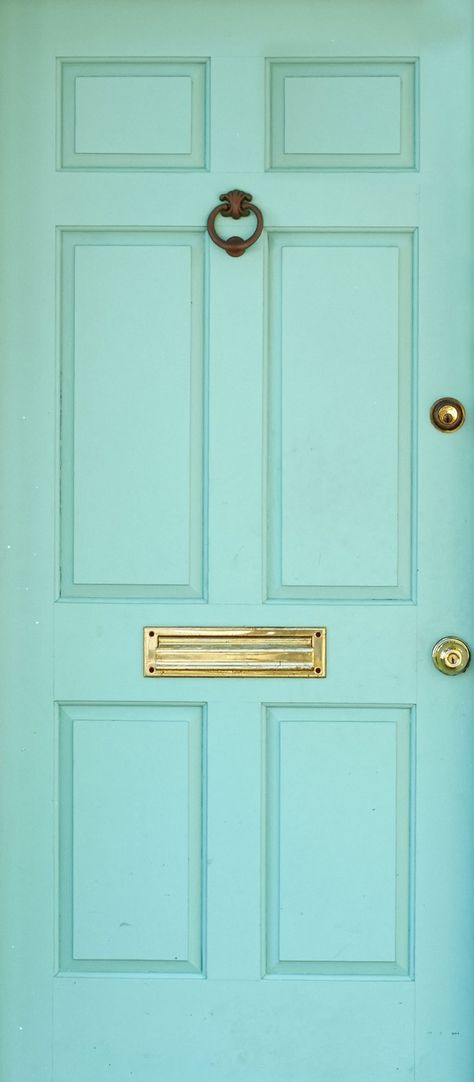 Everything to Consider When Painting Your Front Door | Southern Living Bright Painted Front Doors, Aqua Doors Front Entrance, Light Teal Front Door, Festoon Aqua Front Door, Turquoise Front Door Colors, Turquoise Door Exterior, Tiffany Blue Front Door, Beach House Exteriors, Front Door Paint Ideas