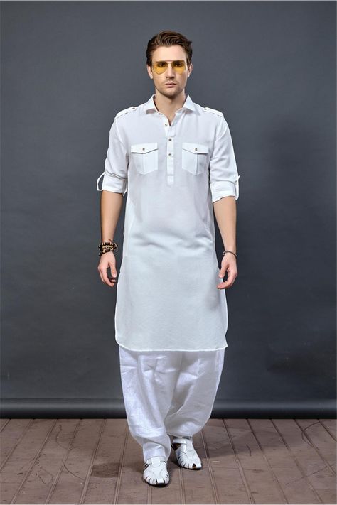 Buy latest Pathani set for Eid 2019 ! This white color Pathani set features from cotton fabric, two flap laple on shoulder, two chest pocket with flap. It comes with white color pathani salwar. Pathani Kurta For Men, White Kurta Men, Mens Pathani, Kurta Designs Men's, Pathani For Men, Pathani Suit, Man Dress Design, Pathani Kurta, Mens Indian Wear