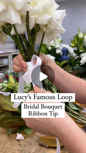 SYDNEY FLORIST • SYDNEY FLOWER DELIVERY • FIVE GENERATIONS 💐 on Instagram: "TIP FOR FLORISTS ✨💫 Watch for a super simple way to ribbon your next bridal bouquet. Using this loop technique means you have no bulky knot when you tie it off. It looks so neat wrapped around the stems.

😆 Disclaimer:  I put Lucy on the spot for the name of this! There may be lots of you using this technique, she’s just famous in our store amongst our florists because we hadn’t seen it before and she’s taught everyone!

😊 Any questions just ask x

#floristtip #floristhack #bouquetribbon #weddingflorist #weddingtip #flowersofspring #sydneyweddings #whiteroses #ribbon" Bridal Bouquet Ribbon Wrap, How To Wrap A Bridal Bouquet With Ribbon, How To Tie Bouquet With Ribbon, Dance Bouquet Ideas, Wedding Bouquet Ribbon Wrap, Bouquet Ribbon Wrap, Wedding Bouquet Ribbon, Diy Bridal Bouquet, Ribbon Bouquet