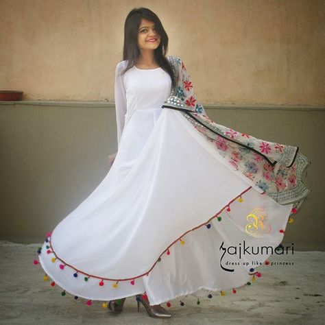 Trending POM-POM!!  . *Lashkara Anarkali* . Material:- Georgette with shantoon lining and pompom lace detailing.  Cost:- 1499/- for anarkali  999/- for dupatta *can be done in every possible color*  #rajkumari_dressuplikeaprincess White Anarkali Dress, White Anarkali, Pakistani Dresses Casual, Kurti Designs Party Wear, Indian Gowns, Dress Indian Style, Lehenga Designs, Indian Designer Outfits, Trendy Collection