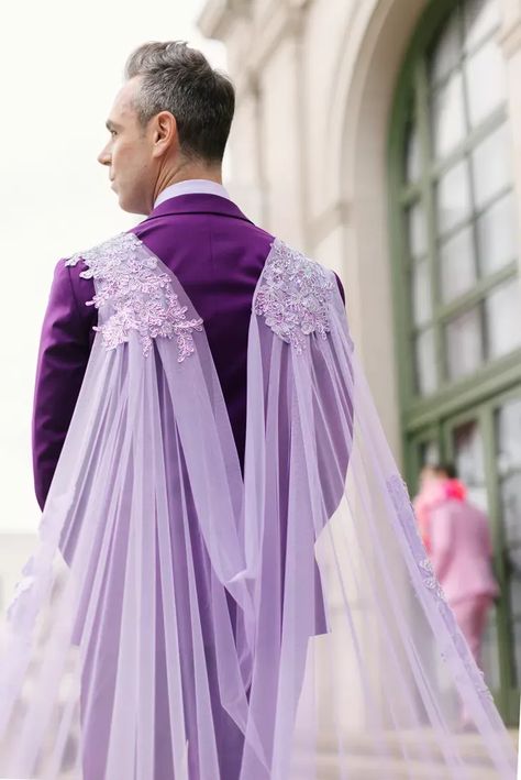 Groom in Purple Tuxedo and Custom, Cascading Cape in the Style of a Cathedral Veil Mens Wedding Suit With Cape, Suits With Capes For Men, Tuxedo Wedding Dress, Tuxedo With Cape, Suit With Train, Suit With Cape, Male Wedding Dress, Cape Men, Purple Tuxedo