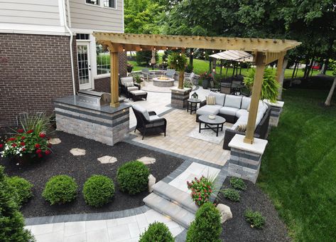 Read all about the details of this canopied corner patio project. Square Patio Layout, Rectangular Patio Layout Ideas, Corner Lot Landscaping Ideas, Corner Lot Landscaping, Corner Patio Ideas, Front Yard Makeover, Corner Patio, Pavers Design, Curved Patio