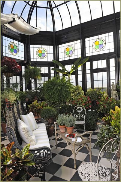 Conservatory with stained glass details, tile flooring, sitting area, lots of plants/greenery. Garden room What Is A Conservatory, Victorian Conservatory, Conservatory Greenhouse, Terrasse Design, Indoor Greenhouse, Greenhouse Interiors, Home Greenhouse, Meteor Garden 2018, Small Greenhouse