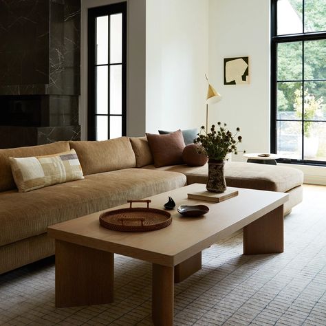 The Expert - Builder-Grade Drywall Was No Match for Joan Enger’s Tailored Approach in This Modern Tudor Jenni Kayne Living Room, How To Layer Rugs, Modern Tudor Interiors, Jenni Kayne Home, Coffee Table Decor Ideas, Modern Tudor, Brown Couch, Table Decor Ideas, Coffee Table Decor