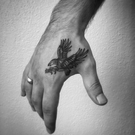 Mini Eagle Tattoo, Eagle Hand Tattoo Men, Thumb Tattoos Men, Eagle Hand Tattoo, Eagle Tattoo On Hand, Eagle Tattoo Arm, Small Tattoo Placement Ideas, Thumb Tattoo, Straight Line Tattoo